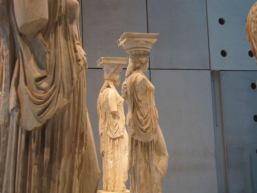 The original Caryatids of the Erechtheion The Caryatids in the Acropolis Museum of Athens